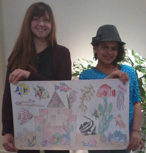 Mya presents "Fish Kingdom" to Millicent